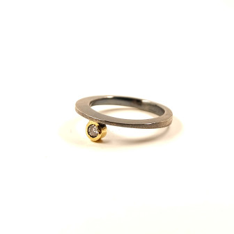 Forged ring with diamond